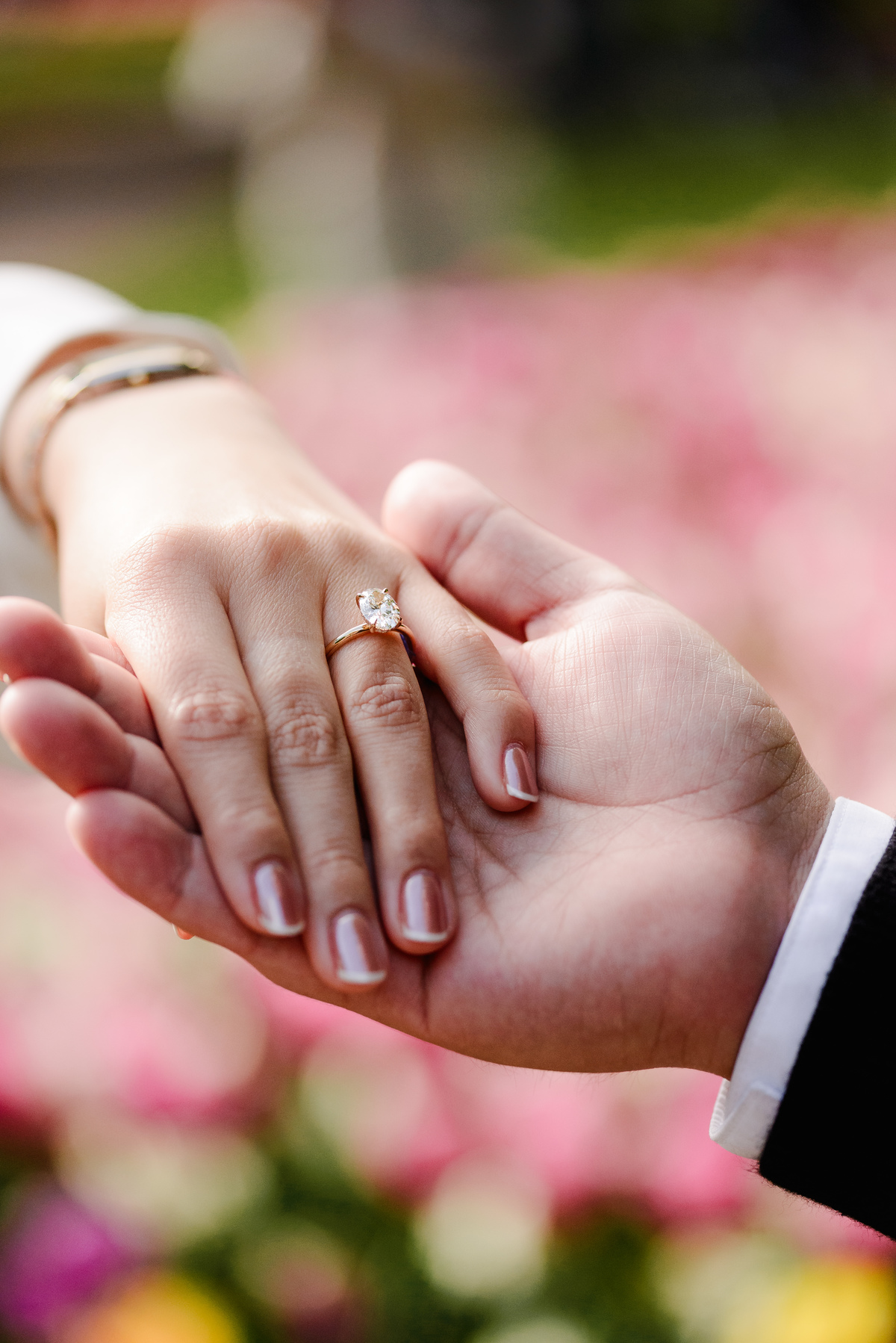 Surprise engagement proposal at Keukenhof Gardens during tulip season in May
