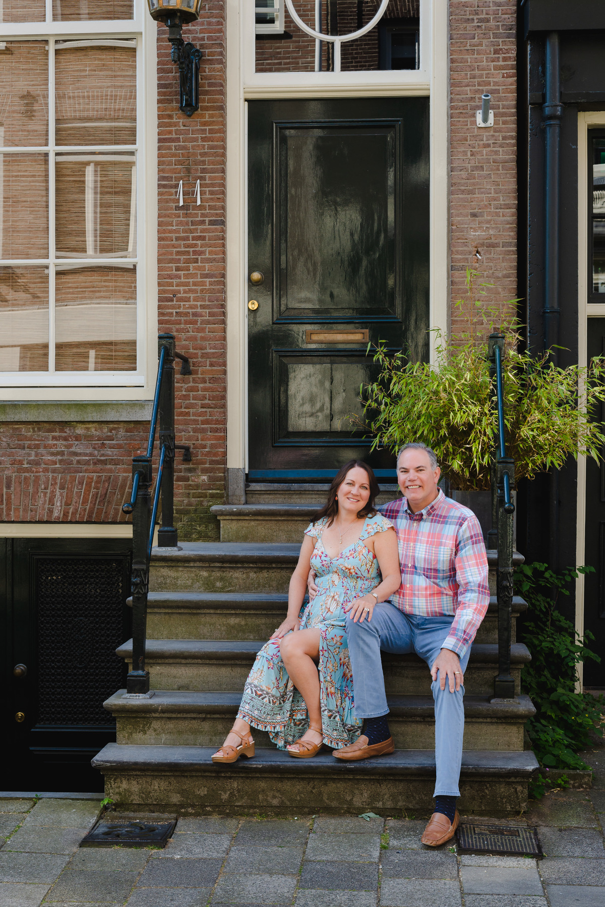 Candid anniversary moment in Amsterdam canal district