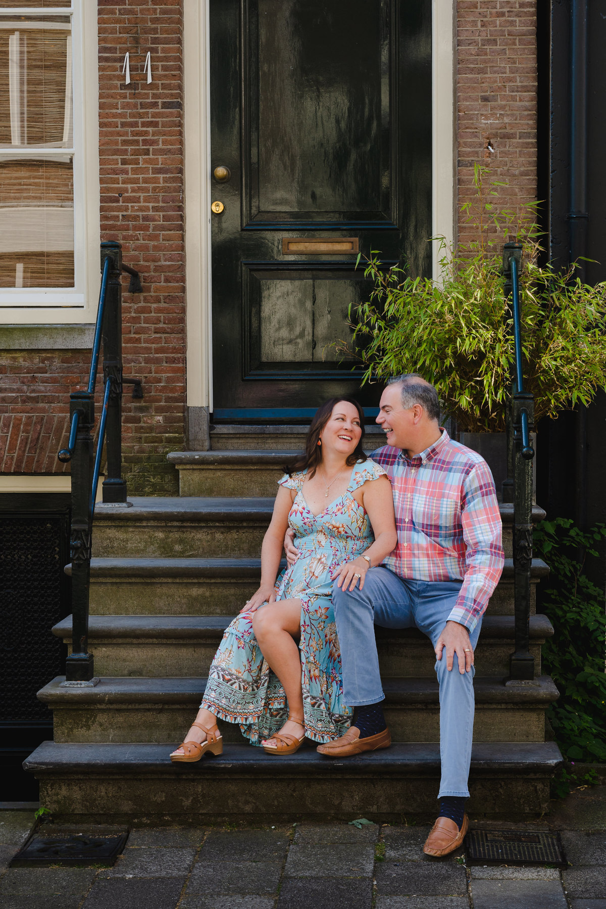 Candid anniversary moment in Amsterdam canal district