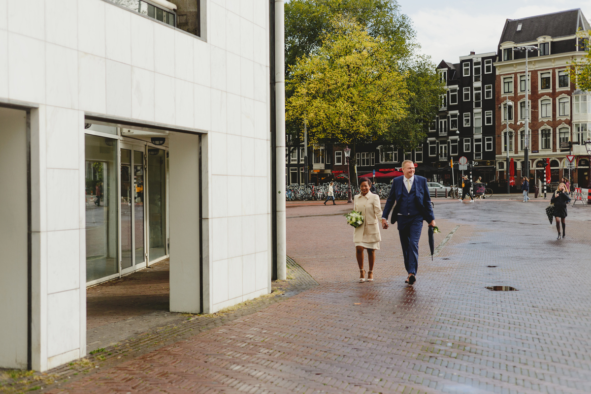 Couple walking towards their civil wedding ceremony in Amsterdam