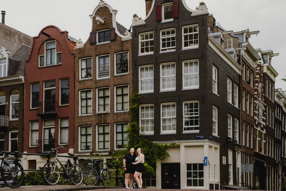 Candid moment of a same-sex couple enjoying their time together in Amsterdam