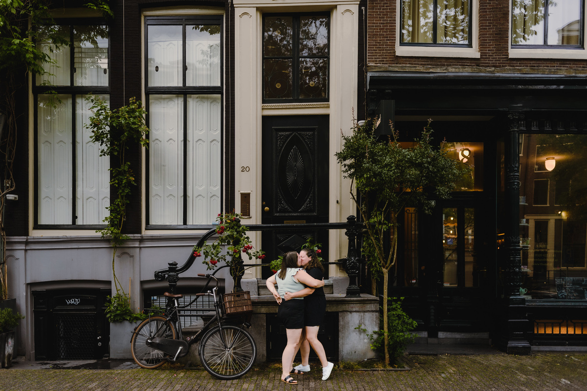 Candid moment of a same-sex couple enjoying their time together in Amsterdam