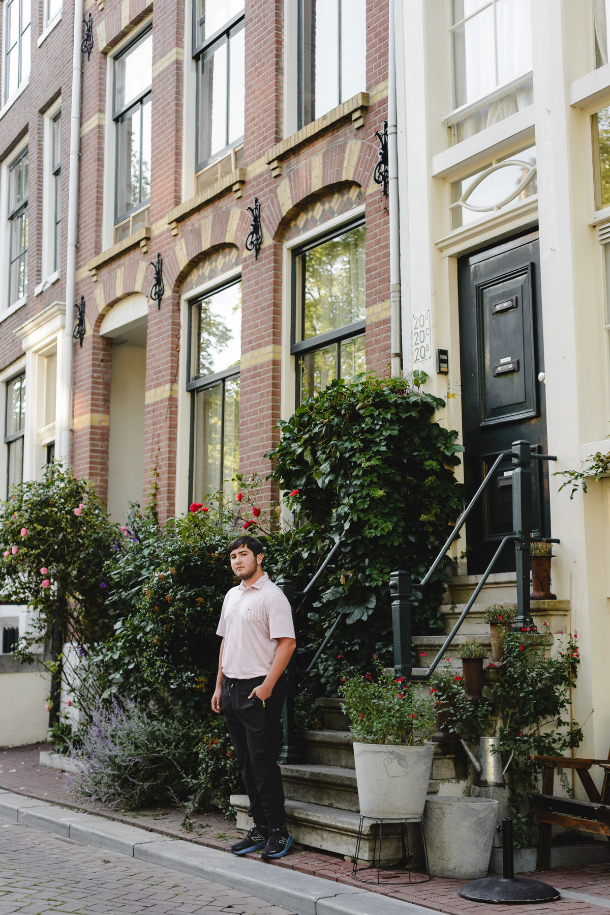 Young boy photographed alone during Amsterdam family vacation photo shoot