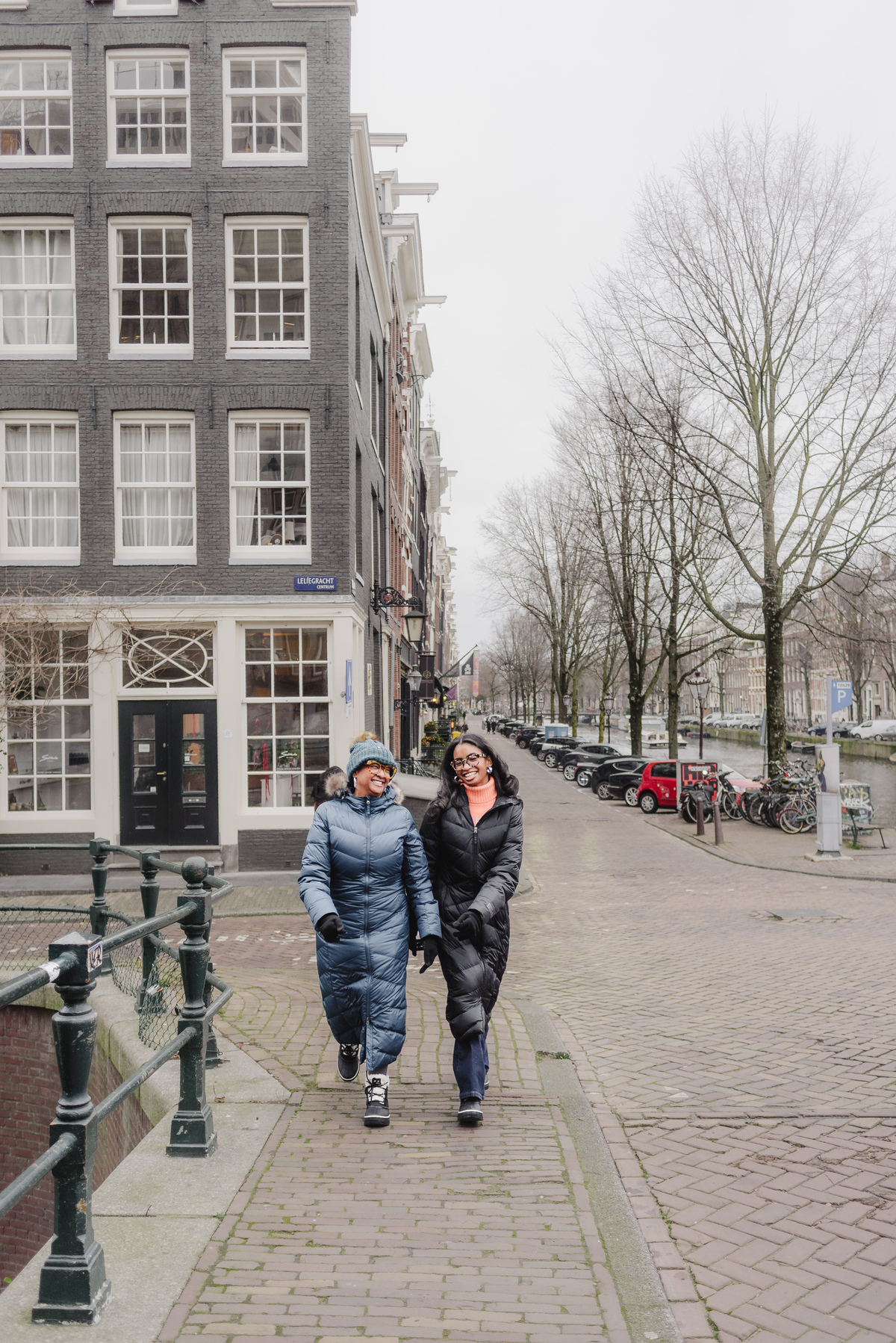 mother and daughter walking in Amsterdam