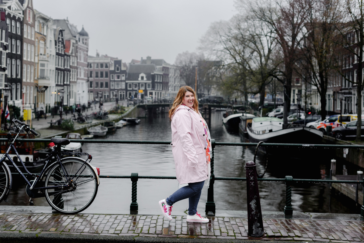 Business traveler portrait with Amsterdam architecture