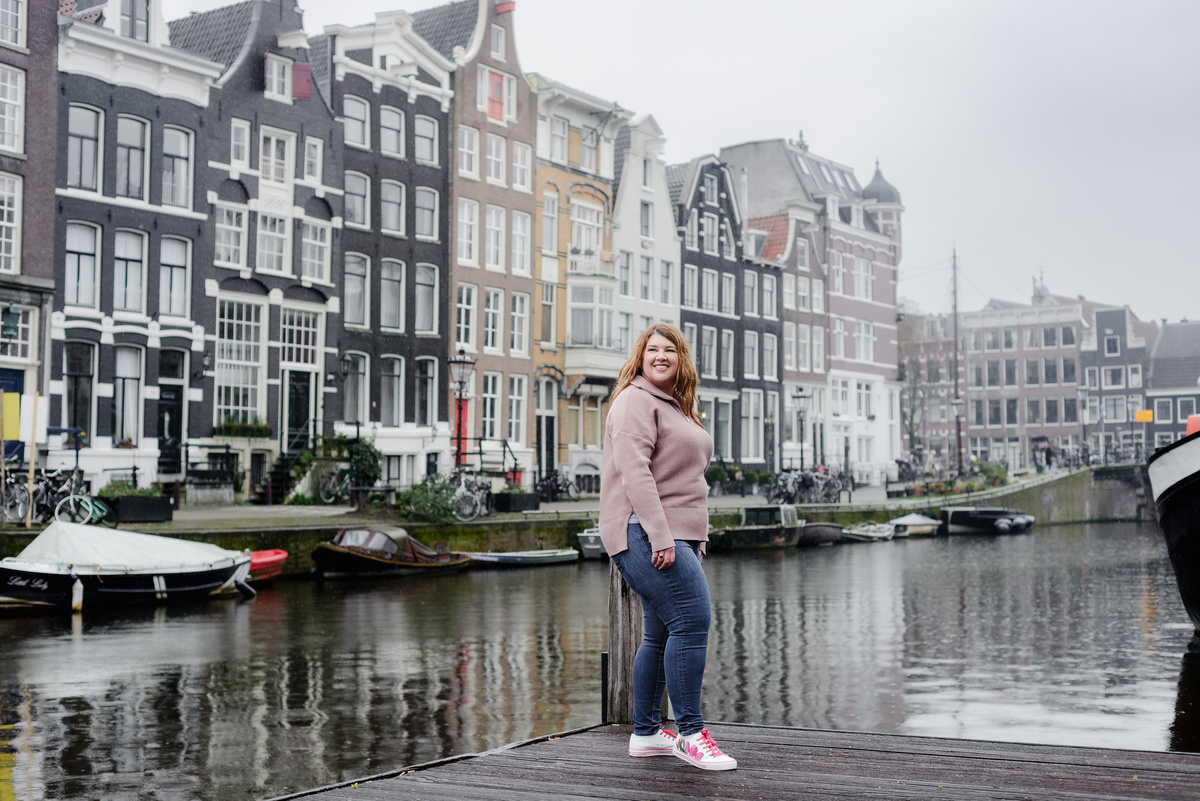 Business traveler portrait with Amsterdam architecture