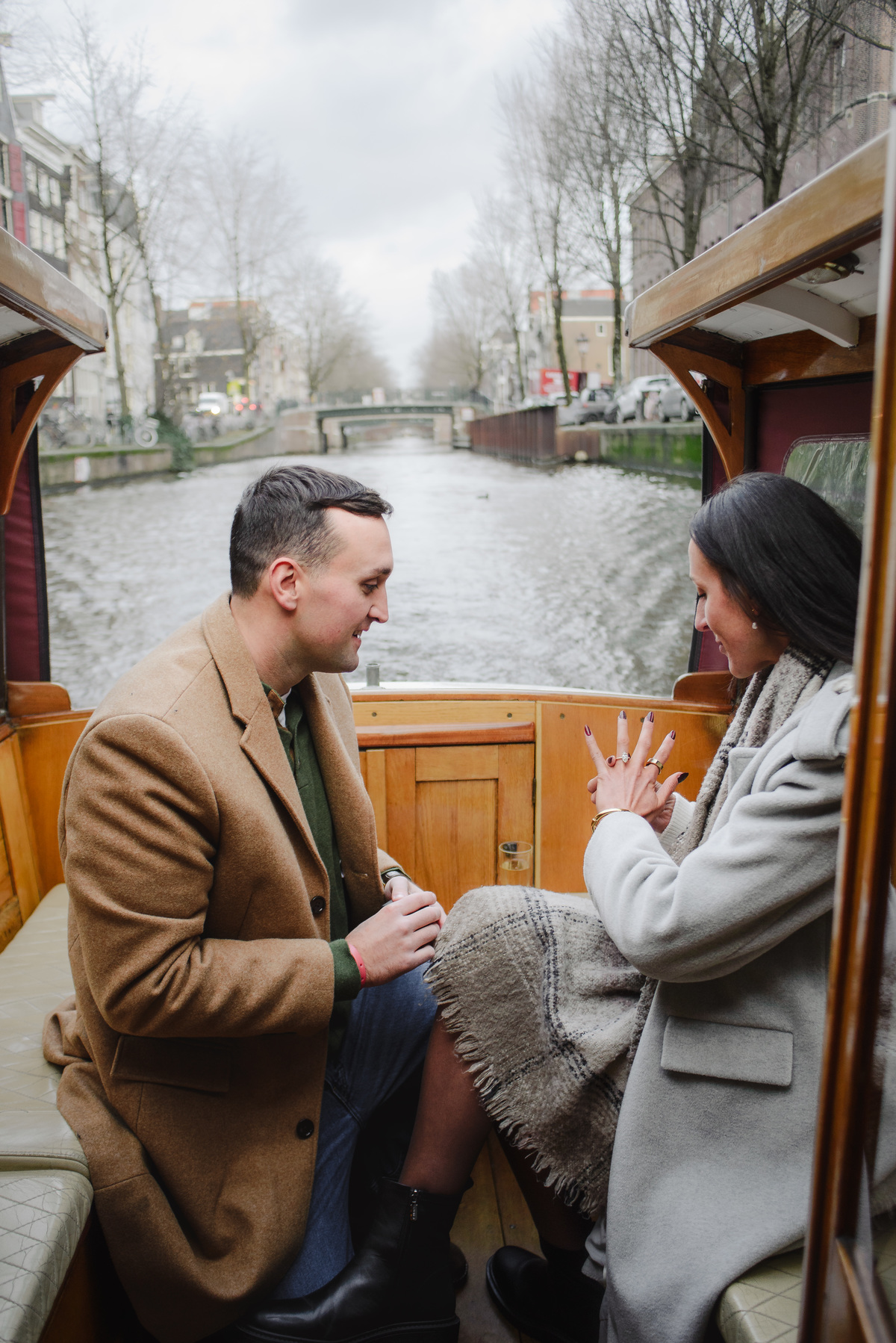 surprise proposal on canal boat Amsterdam