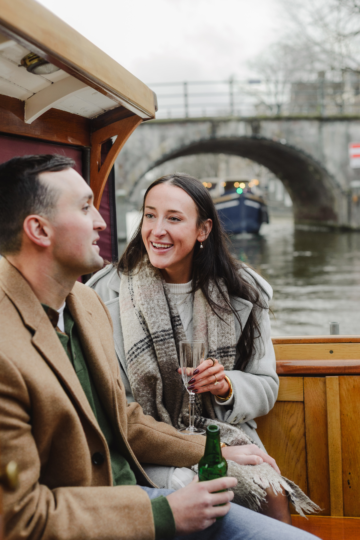 surprise proposal on canal boat Amsterdam