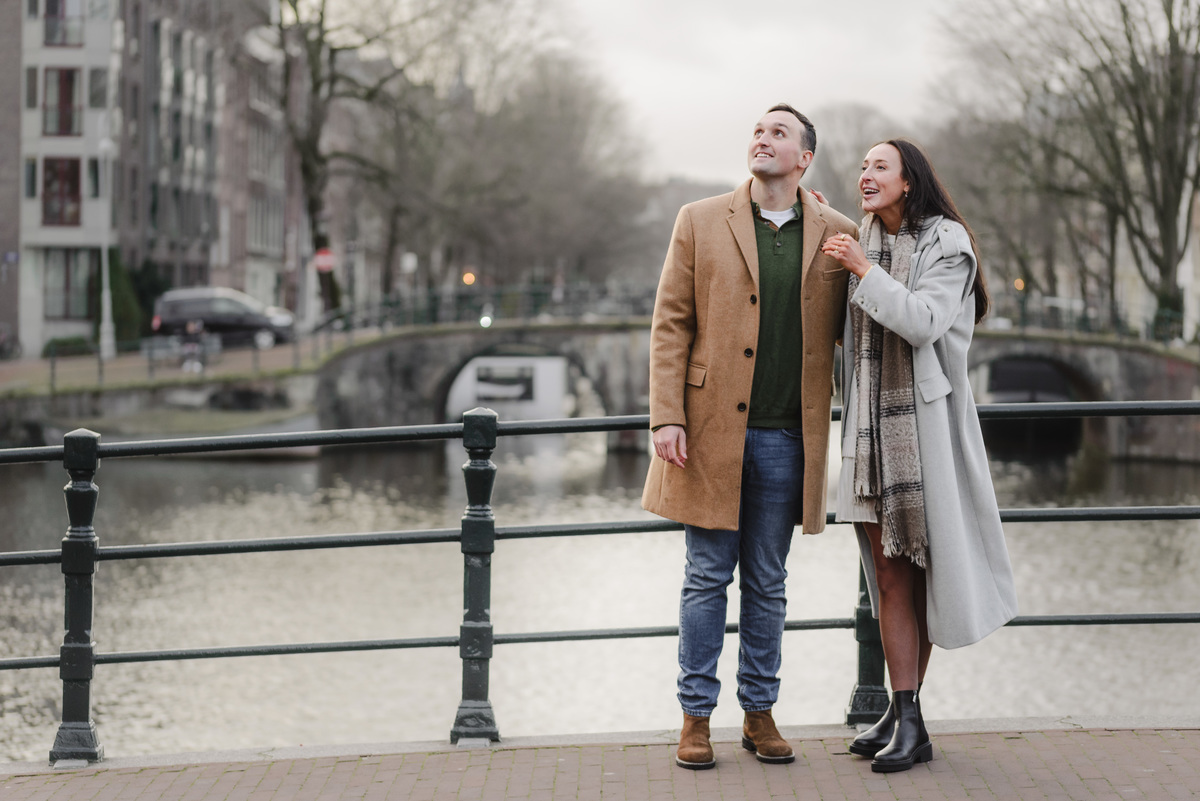 surprise proposal on canal boat Amsterdam