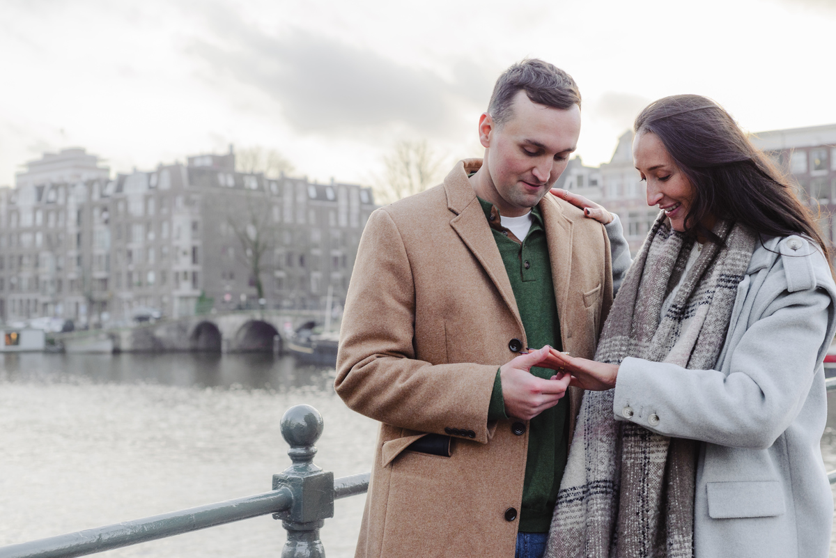 surprise proposal on canal boat Amsterdam