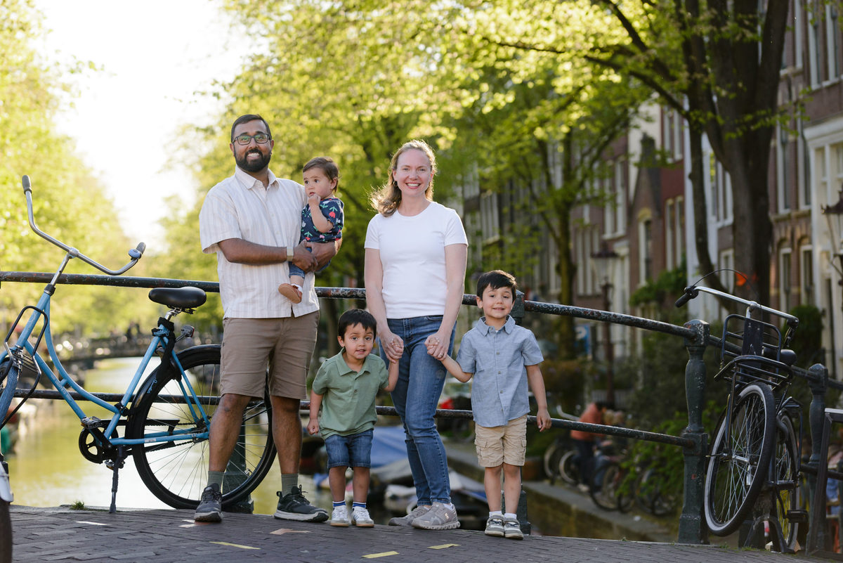 Parents and children walking through Amsterdam