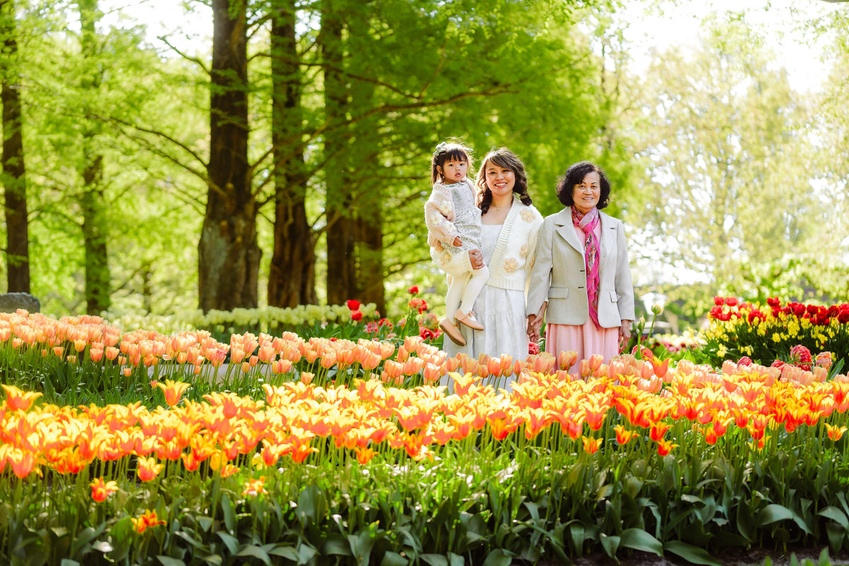 Three generations of a family enjoying the tulip displays at Keukenhof Gardens