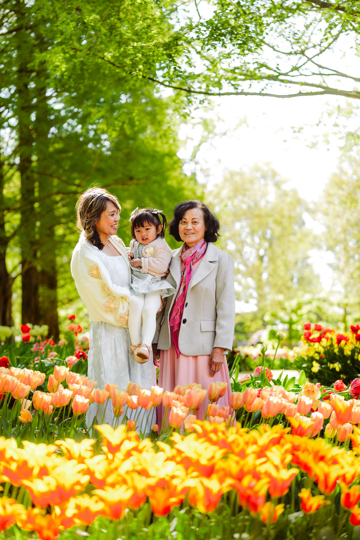 Three generations of a family enjoying the tulip displays at Keukenhof Gardens