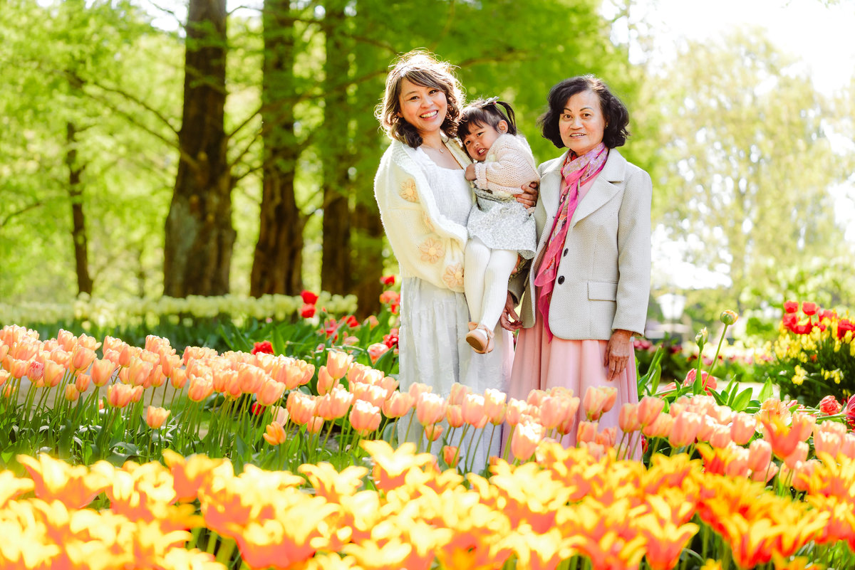 Three generations of a family enjoying the tulip displays at Keukenhof Gardens