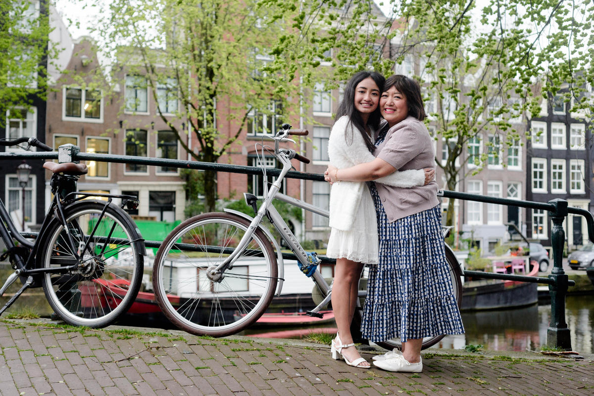 Daughter smiling during a family photography session in Amsterdam