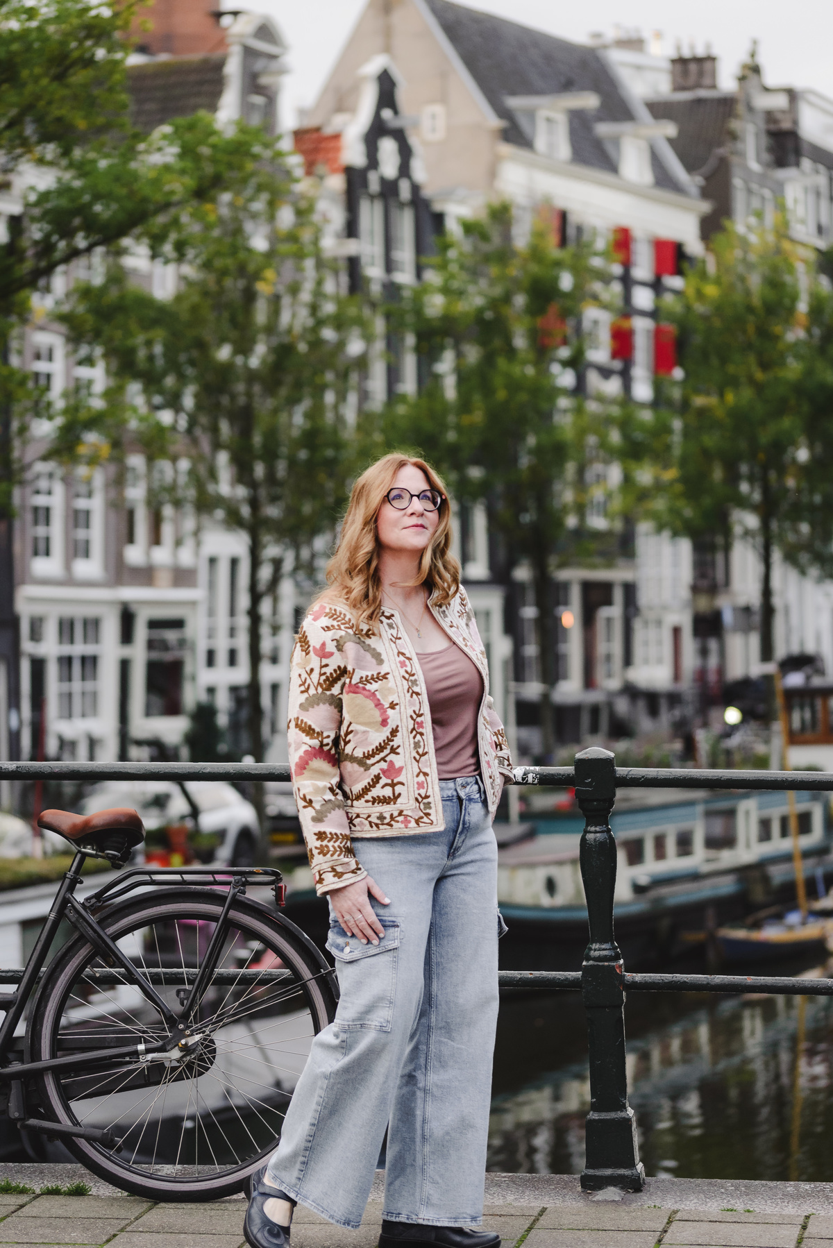 Female business owner walking in the streets of Amsterdam. This was part of a business portrait photo session. 