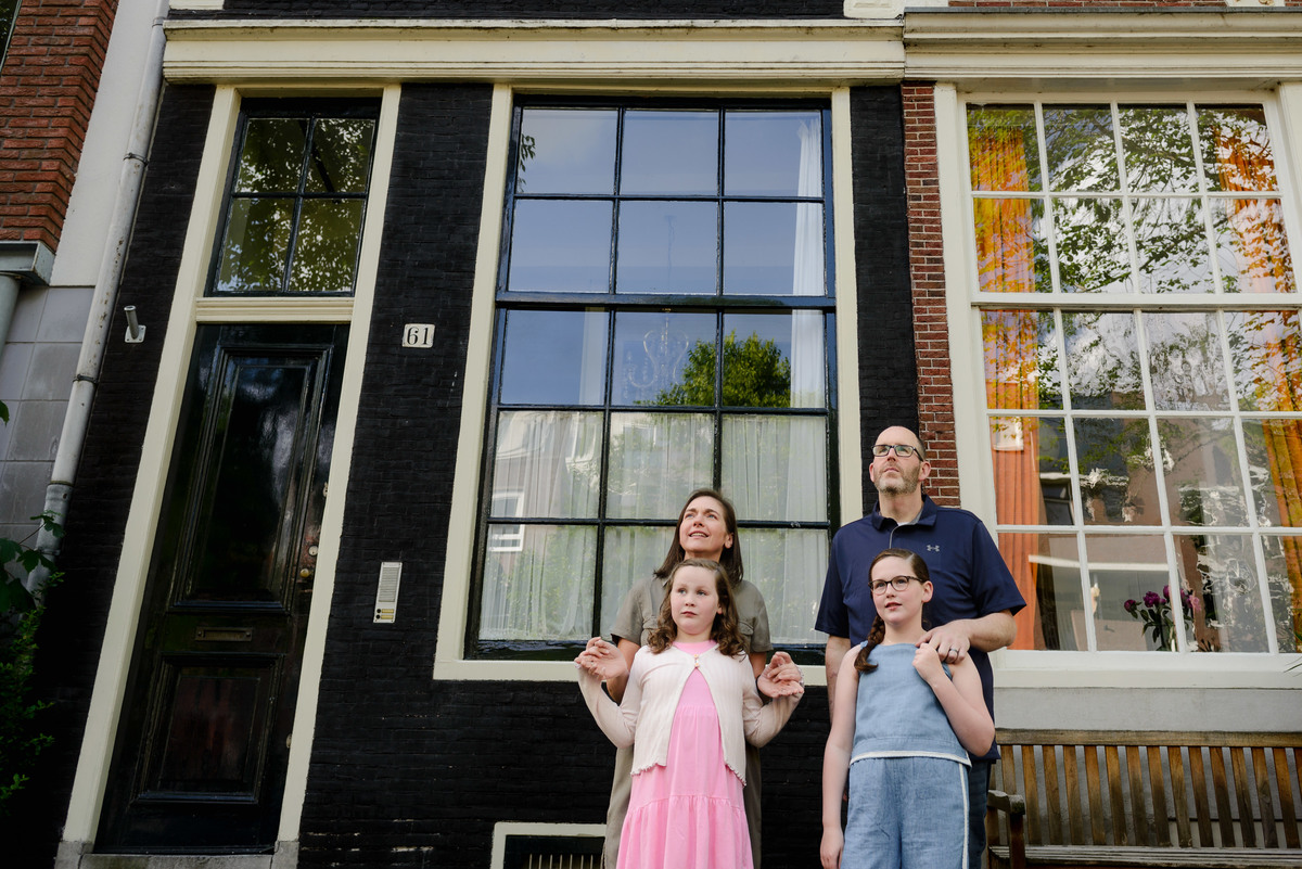 Natural family portraits captured during an Amsterdam vacation.
