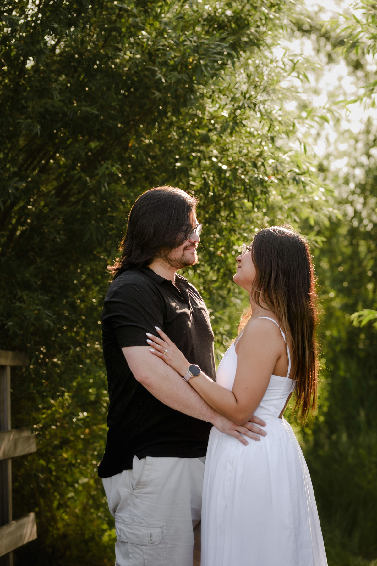 Candid engagement portrait surrounded by nature in Westerpark.