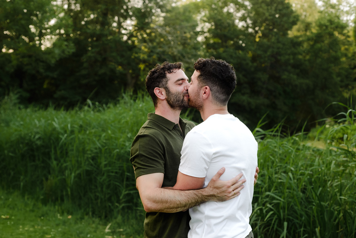 Couple embracing after saying yes during a proposal in Amsterdam.