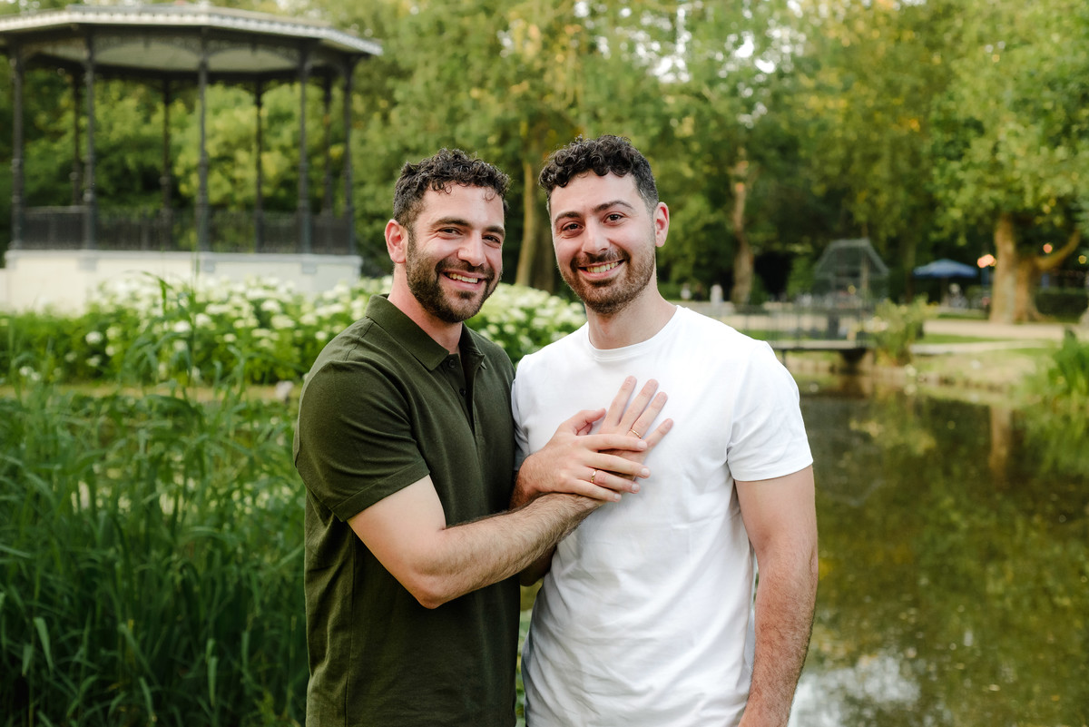 Couple embracing after saying yes during a proposal in Amsterdam.
