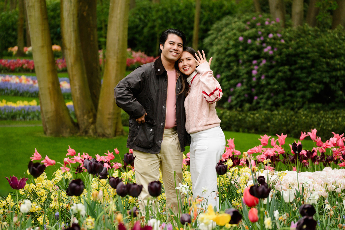 Emotional engagement proposal among colourful tulips at Keukenhof.