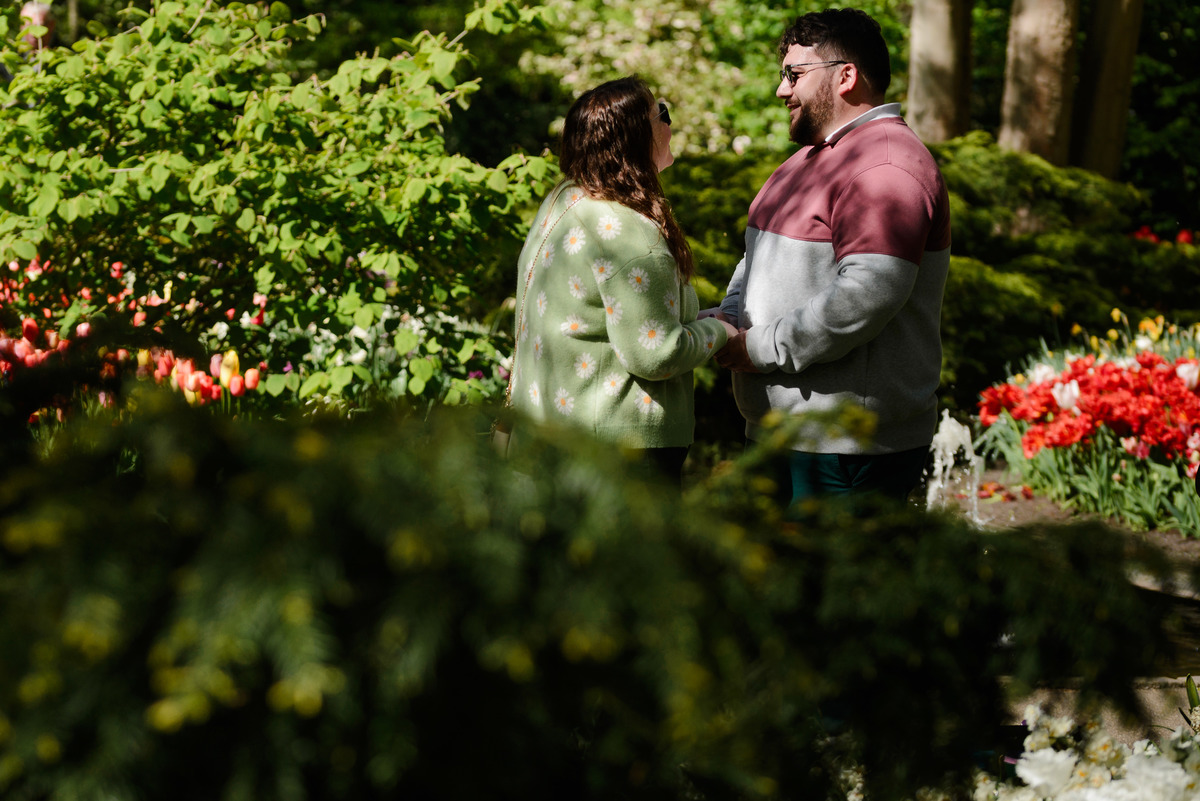 Emotional marriage proposal captured at Keukenhof Gardens.