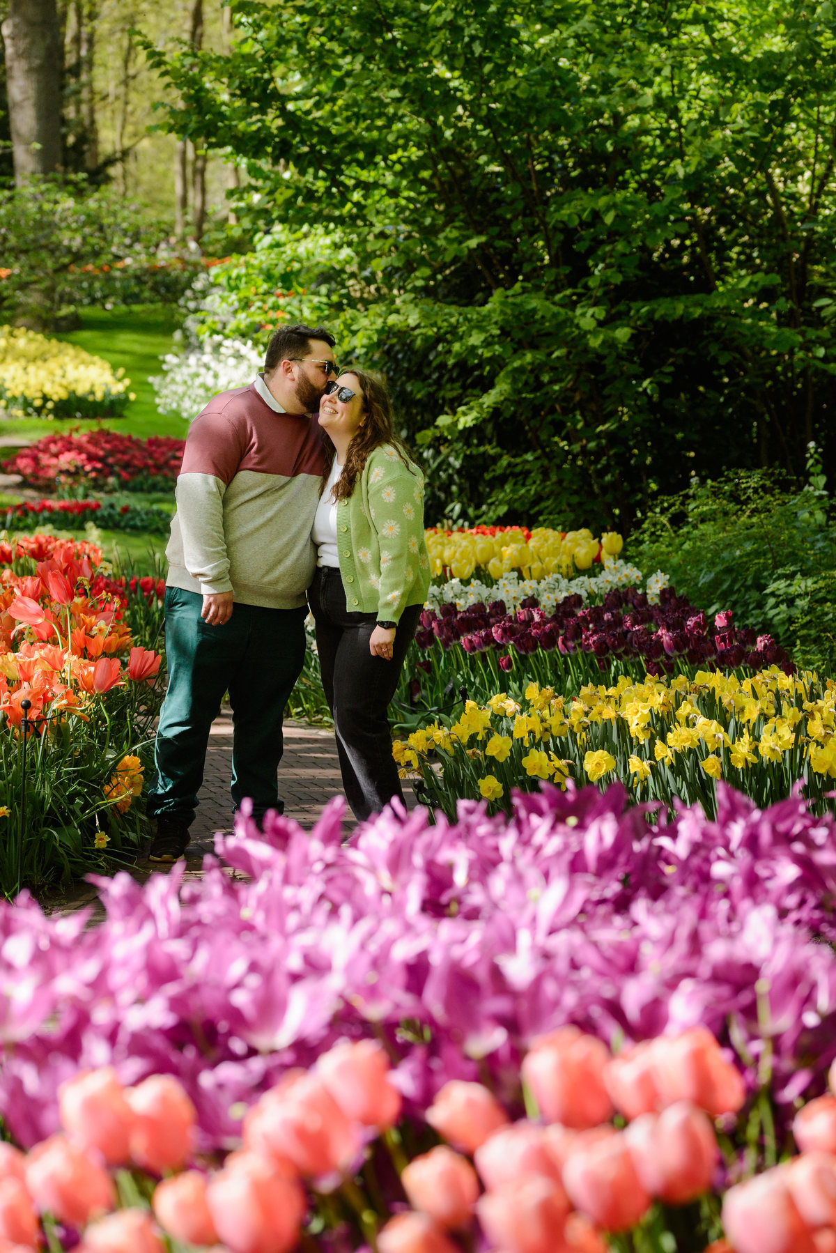 Natural engagement photography during tulip season in the Netherlands.
