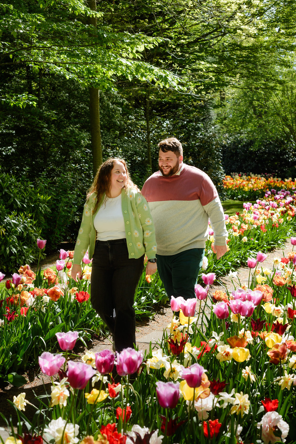 Romantic engagement portraits surrounded by tulips at Keukenhof.