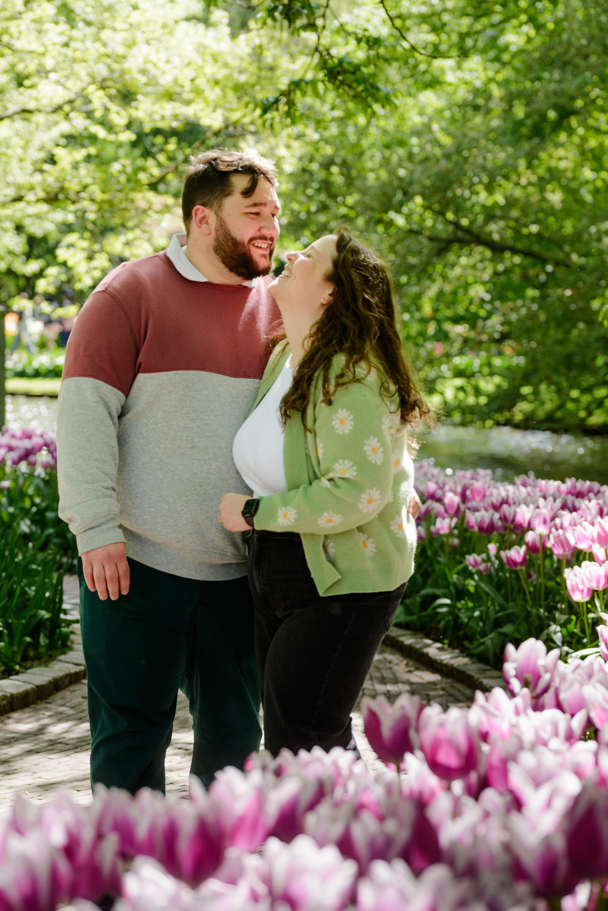 Romantic engagement portraits surrounded by tulips at Keukenhof.
