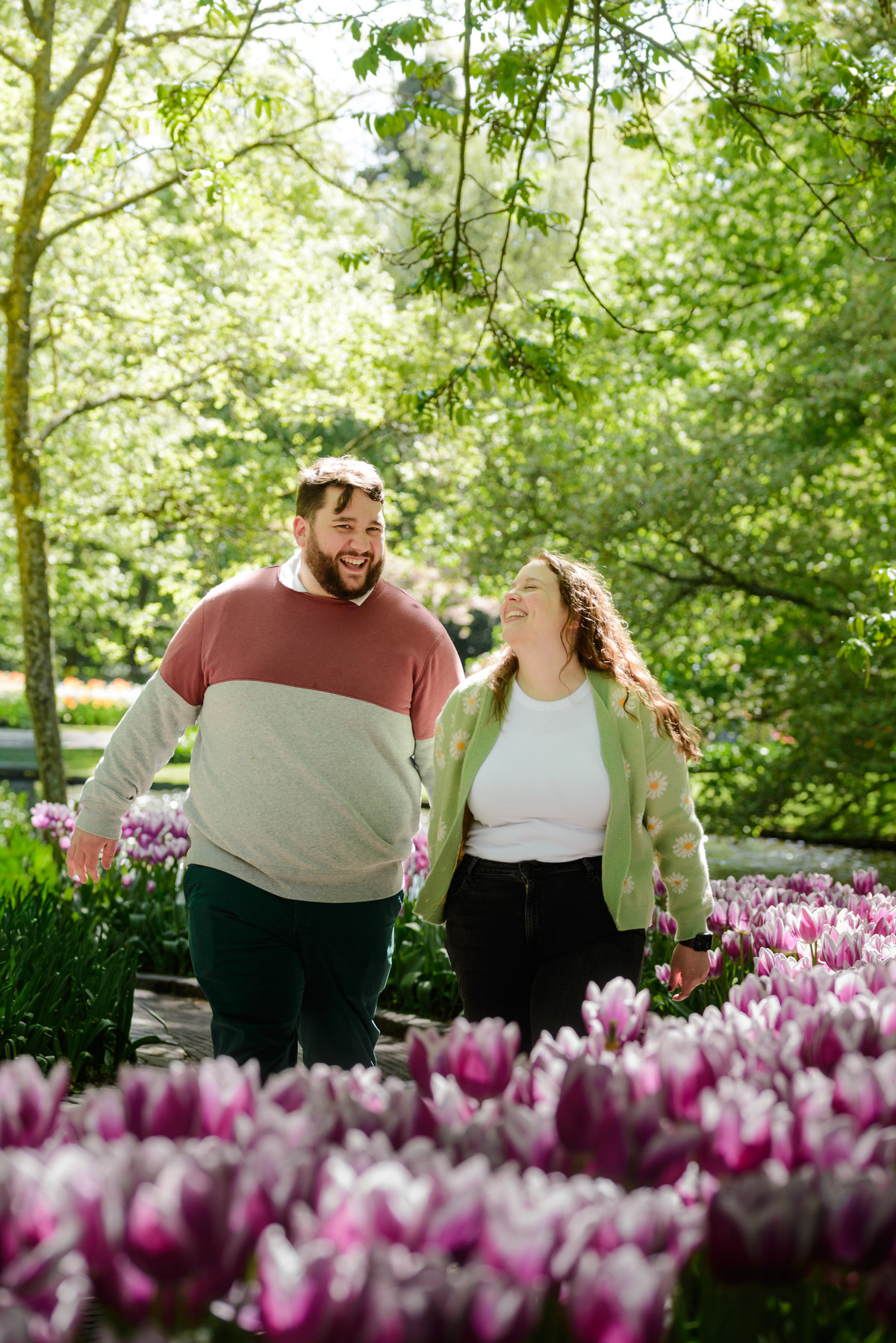 Romantic engagement portraits surrounded by tulips at Keukenhof.