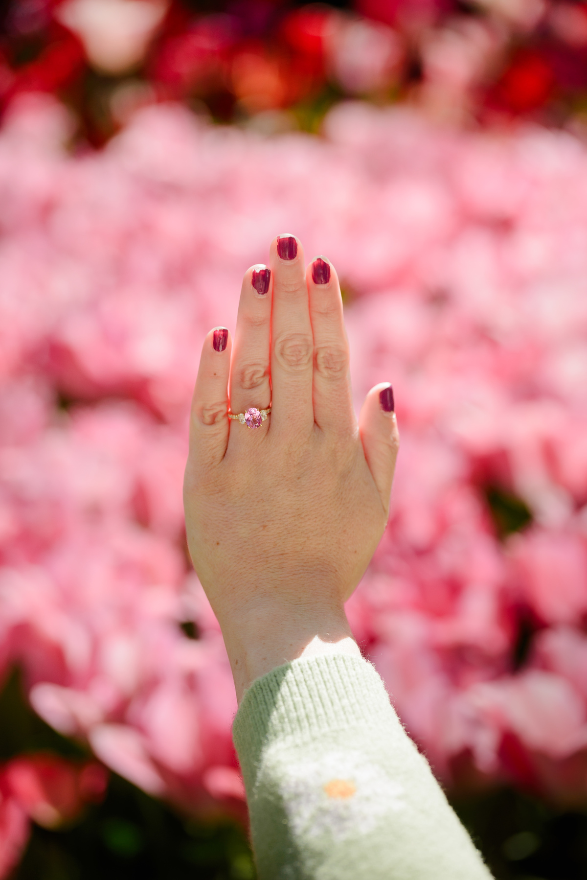 Close-up of an engagement ring after a surprise proposal.