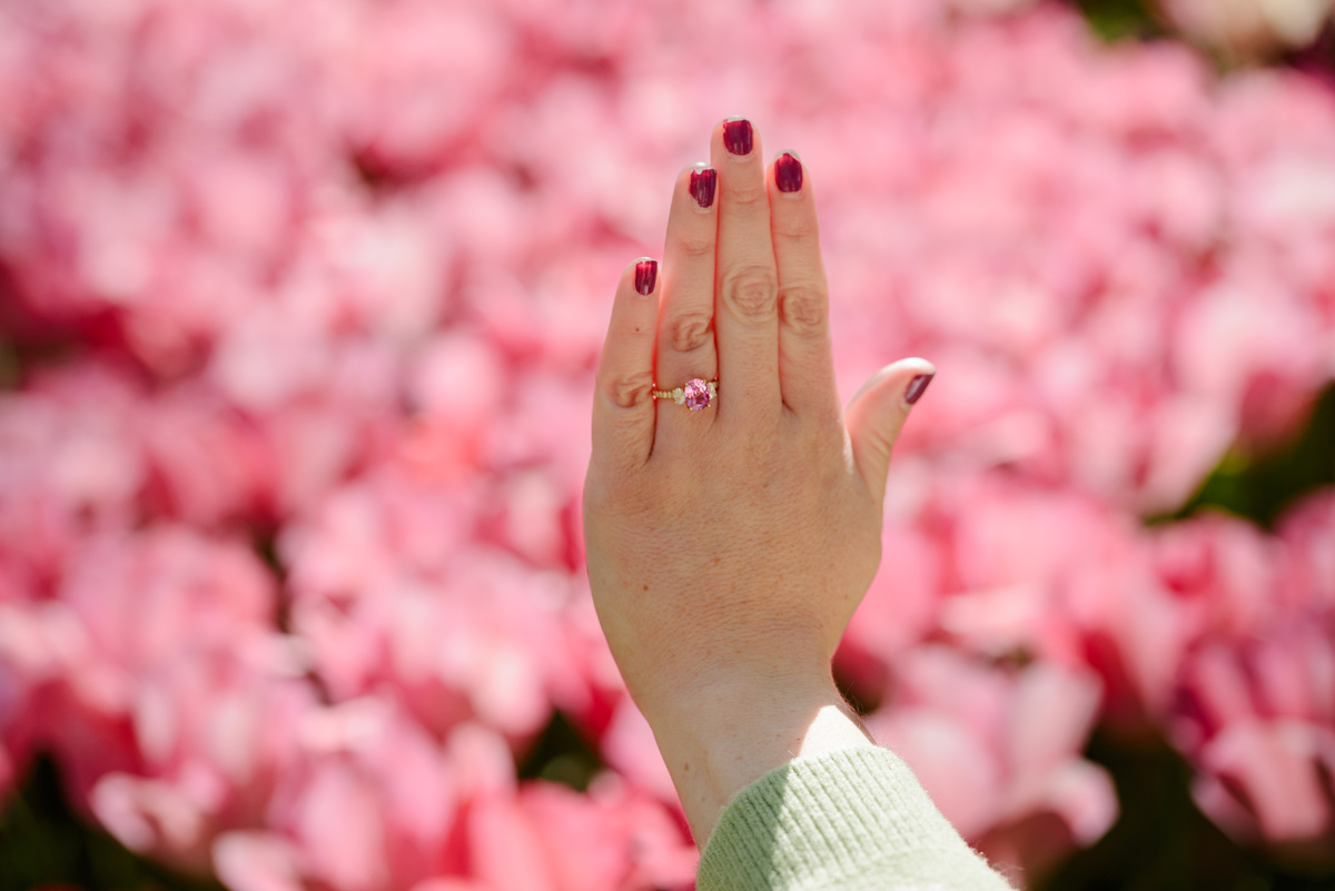 Close-up of an engagement ring after a surprise proposal.