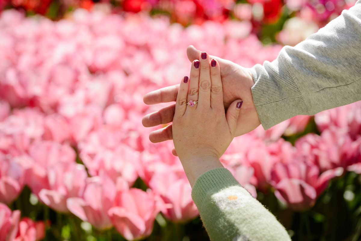 Close-up of an engagement ring after a surprise proposal.