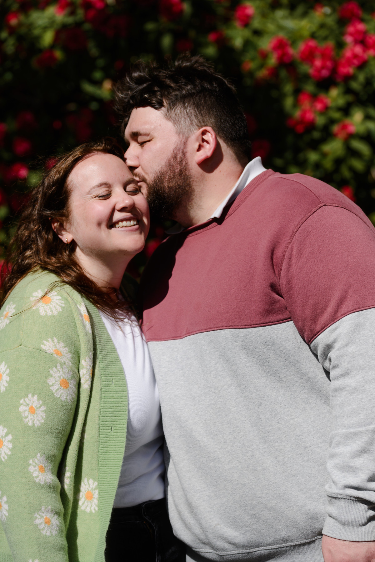 Couple embracing in the colourful gardens of Keukenhof.