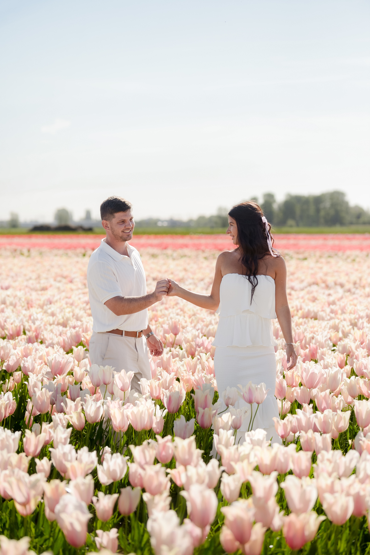 Natural couple photography during tulip season in the Netherlands.
