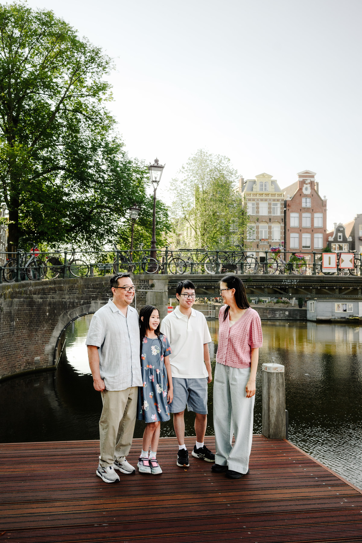Candid family photograph in Amsterdam's historic city centre.