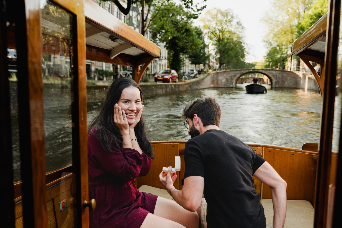Surprise proposal on a private Amsterdam canal boat.