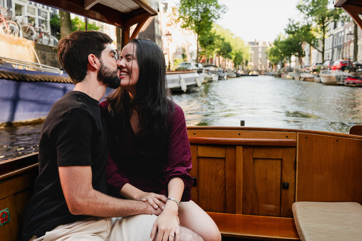 Couple celebrating their engagement on Amsterdam's canals.