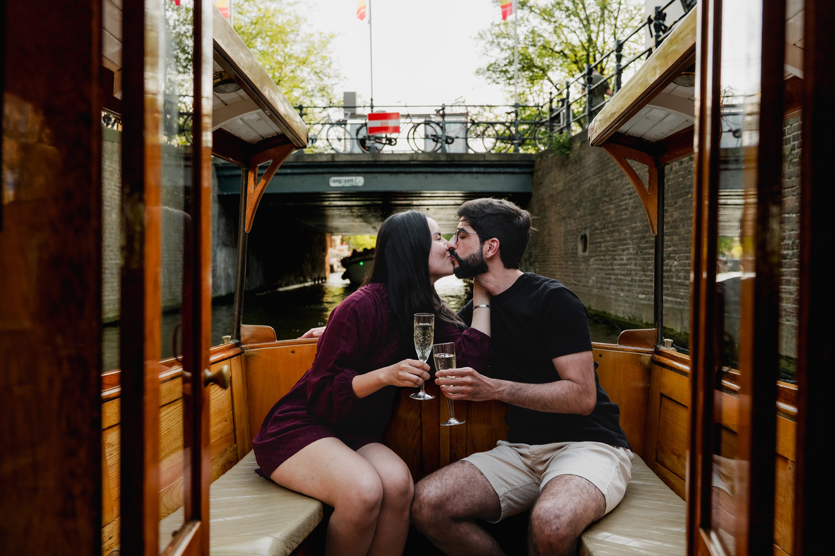 Couple celebrating their engagement on Amsterdam's canals.