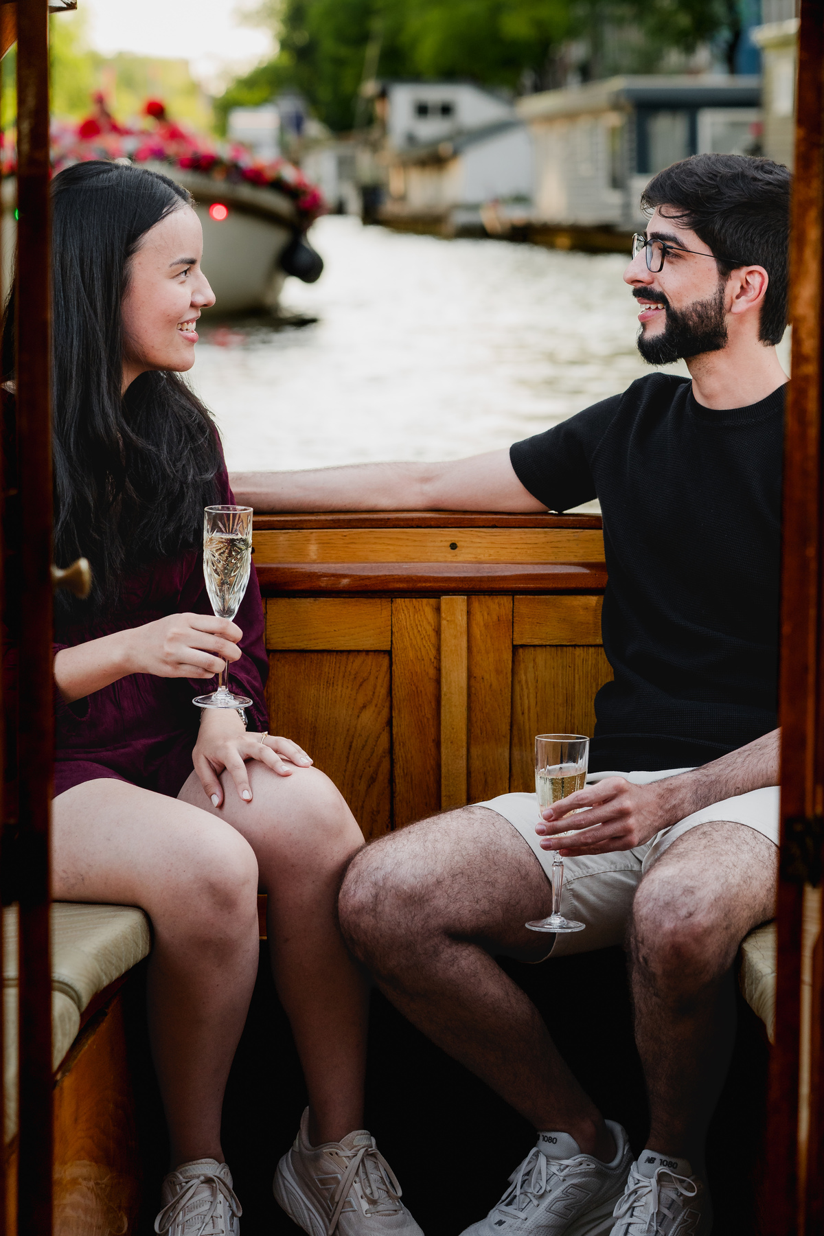 Marriage proposal captured aboard a historic Amsterdam canal boat.