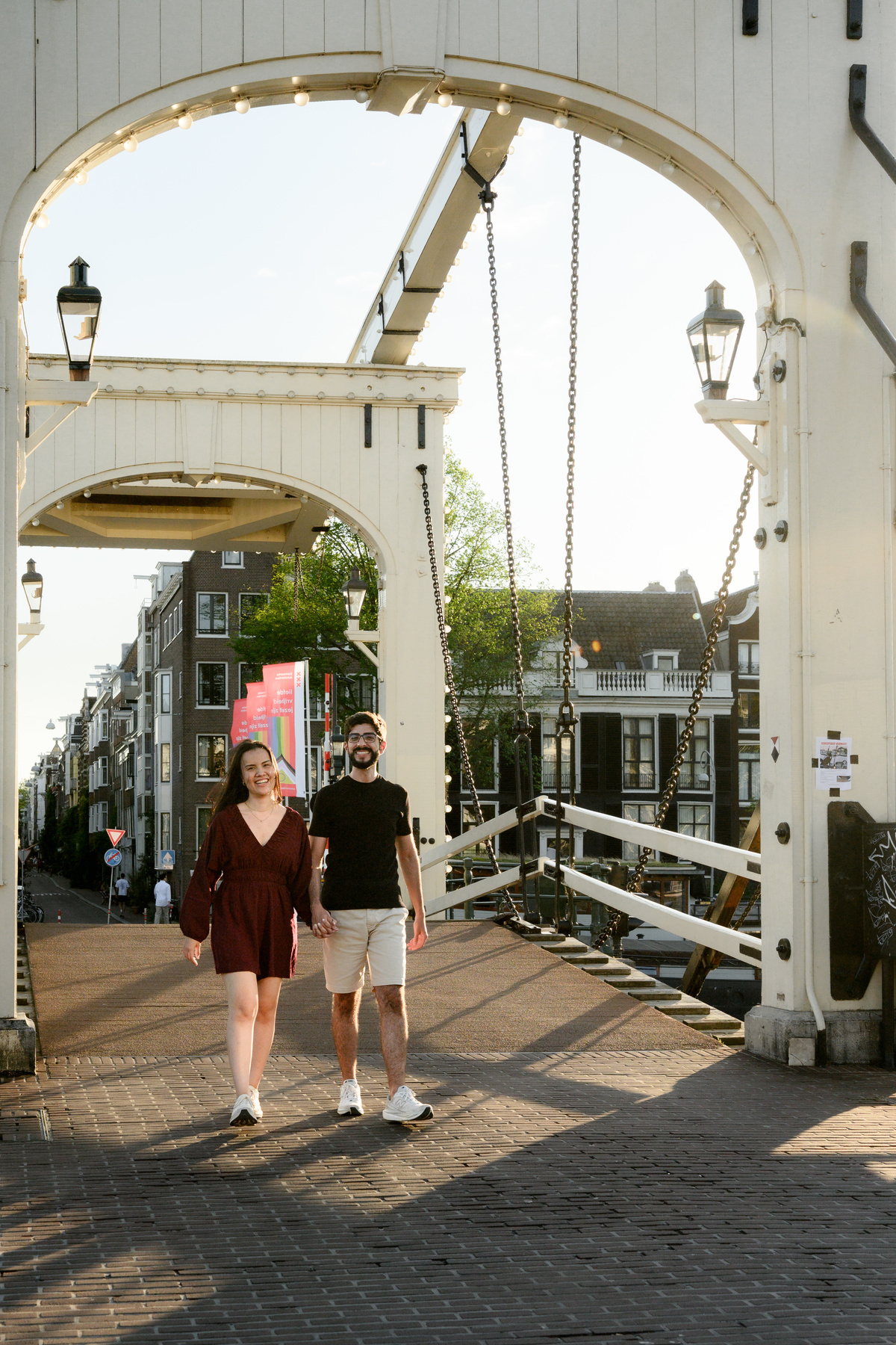 Romantic engagement portrait beside Amsterdam river after the proposal.