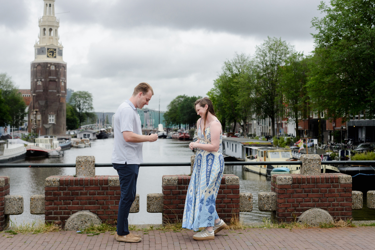 Surprise morning proposal on Keizerbrug in Amsterdam