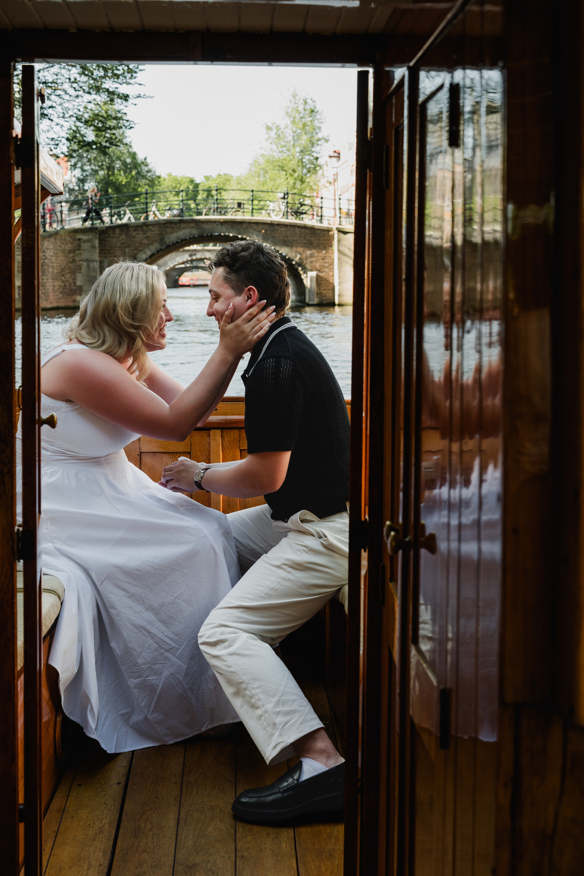 Surprise proposal beneath the Seven Bridges in Amsterdam