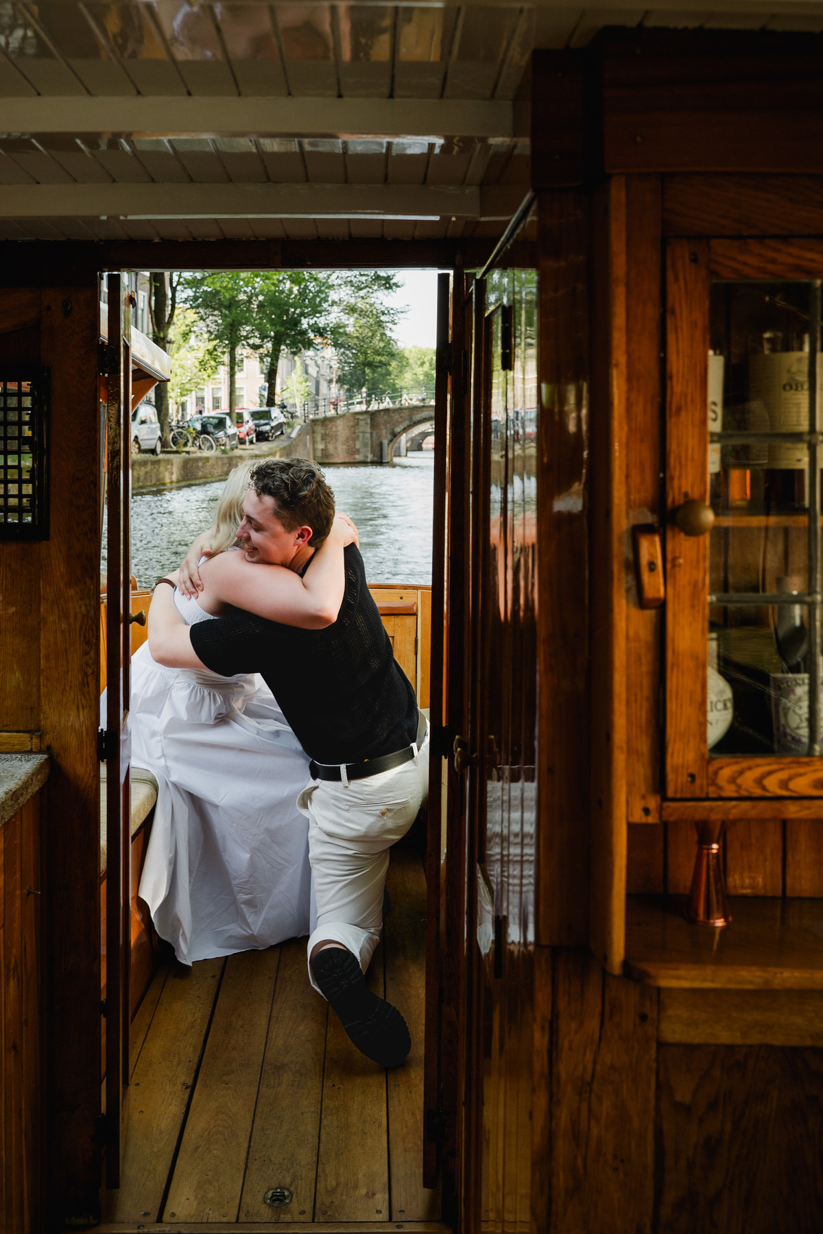 Man proposing on a private canal boat in Amsterdam