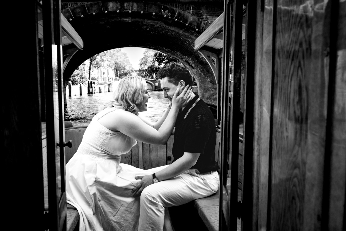 Engagement ring moment aboard a historic Amsterdam canal boat