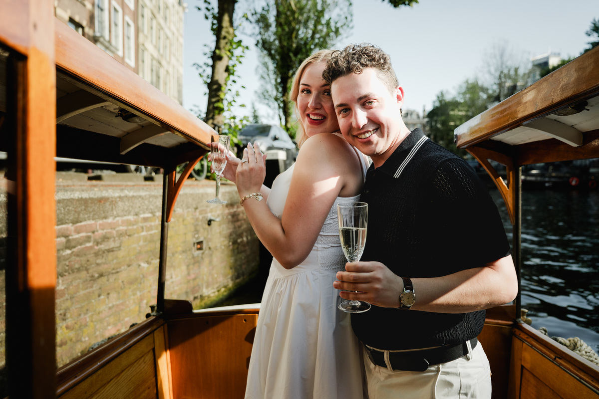 Newly engaged couple continuing their canal journey before dinner
