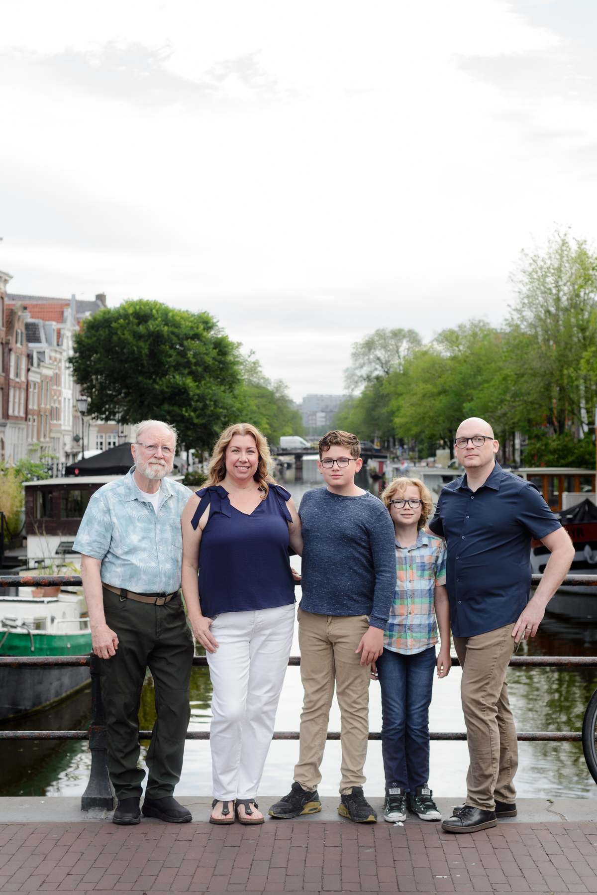 Family relaxing together during an Amsterdam vacation photoshoo