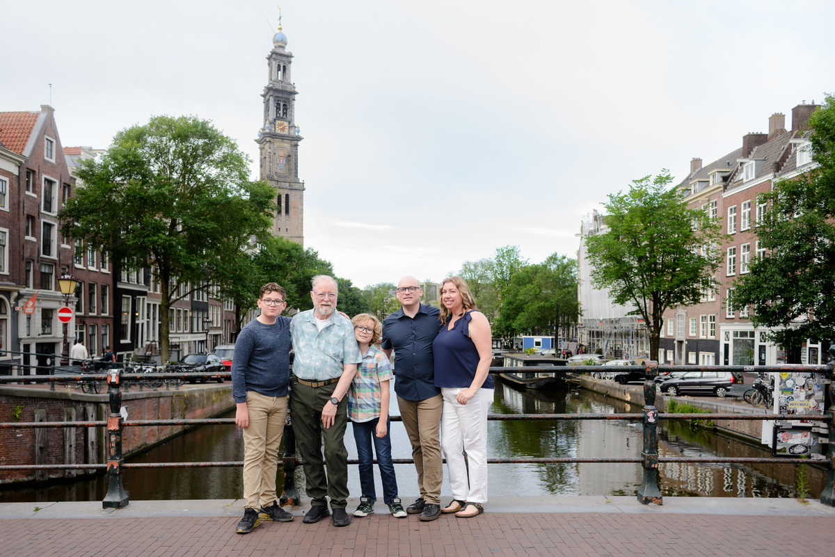Family relaxing together during an Amsterdam vacation photoshoo
