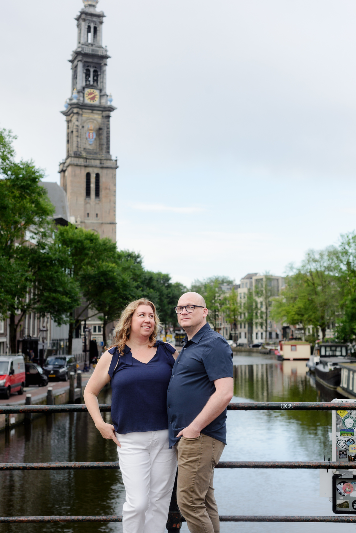 Couple photographed next to a canal view in Amsterdam 