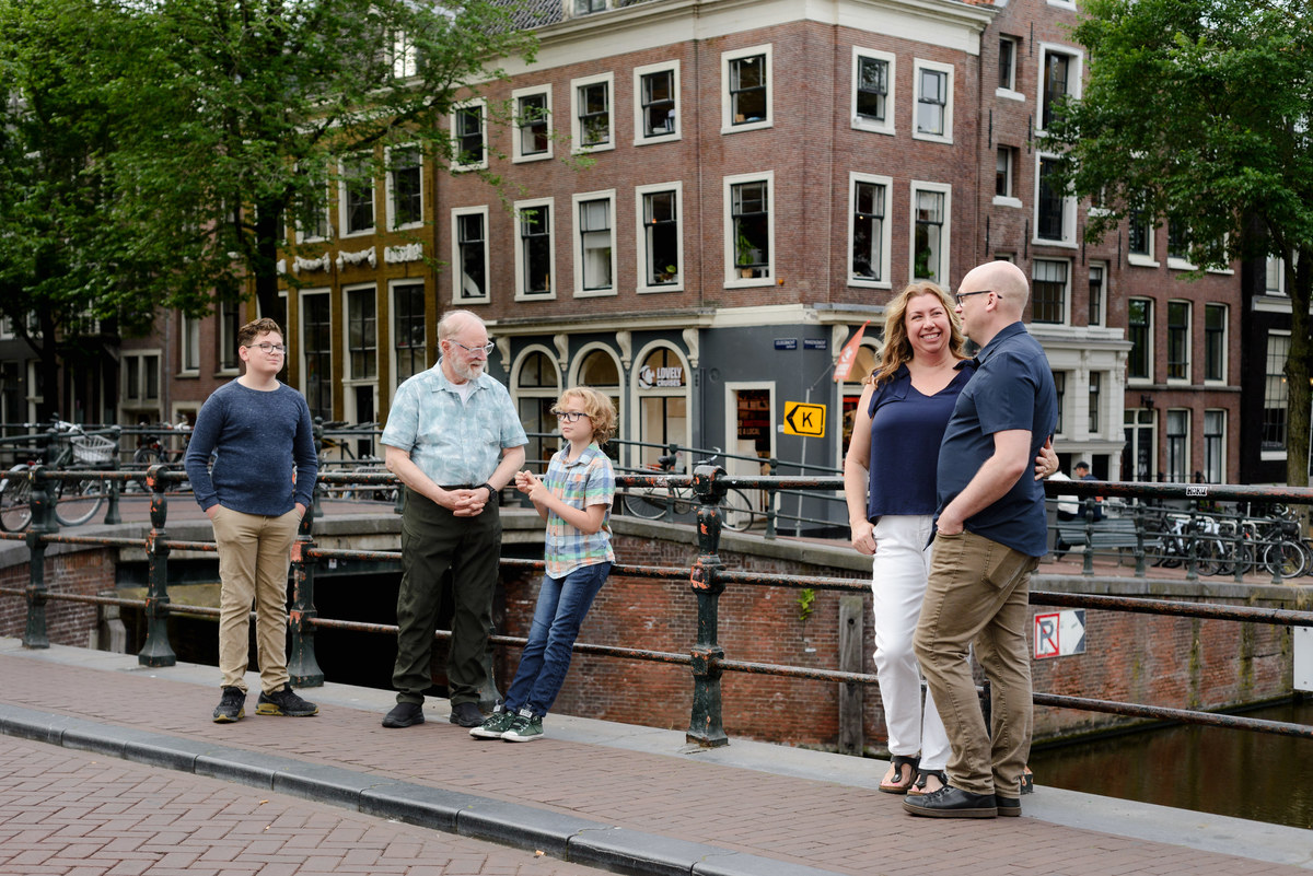 Family relaxing together during an Amsterdam vacation photoshoo